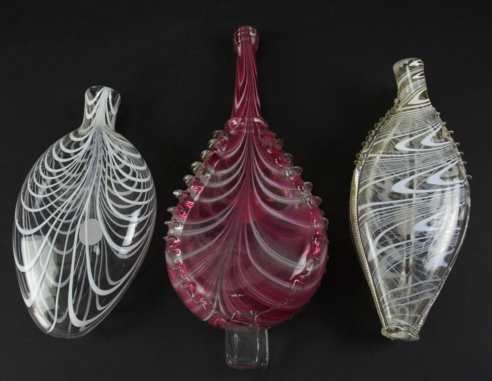 19thC English Blown Nailsea Glass Flasks: 19th century English blown Nailsea glass flasks, to include: one (1) cranberry and one (1) double flask, three (3) total. 12 1/2". Good condition. Provenance: Estate of Dalia Zikas, Melrose, Massachus