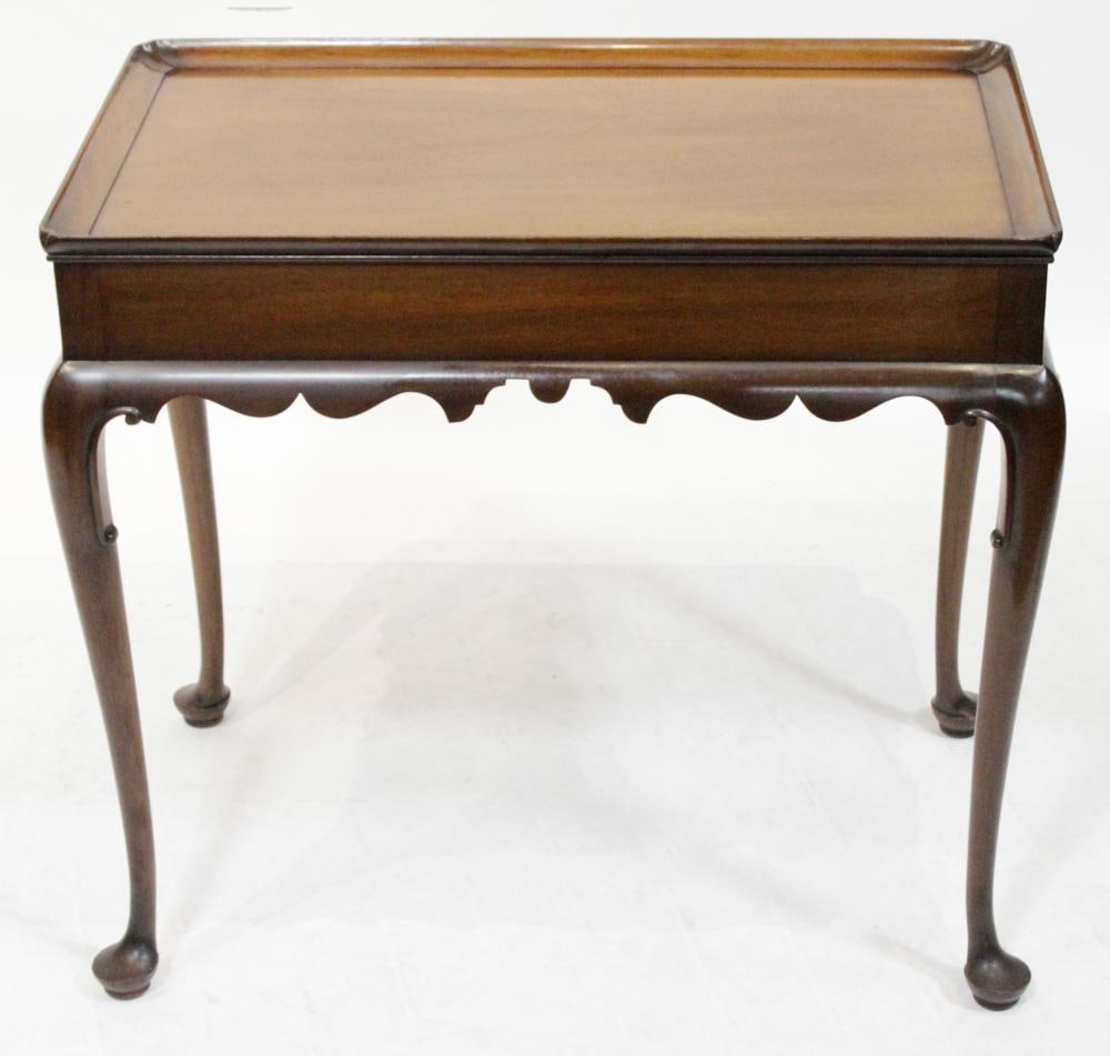 Vintage Kittinger Queen Anne Style Table with Sliding Trays: Vintage Kittinger "Williamsburg Restoration/Plantation Finish" mahogany Queen Anne style table with sliding tray on both ends, 26 1/2" H x 29" W x 18" D. Good condition. Provenance: Estate of Dalia Zi