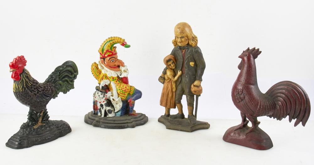 Group of Cast Iron Doorstops: Four (4) cast iron doorstops, to include: Punch, old man and child, two roosters. Tallest 14 1/2". Minor expected wear. Provenance: Estate of Dalia Zikas, Melrose, Massachusetts.