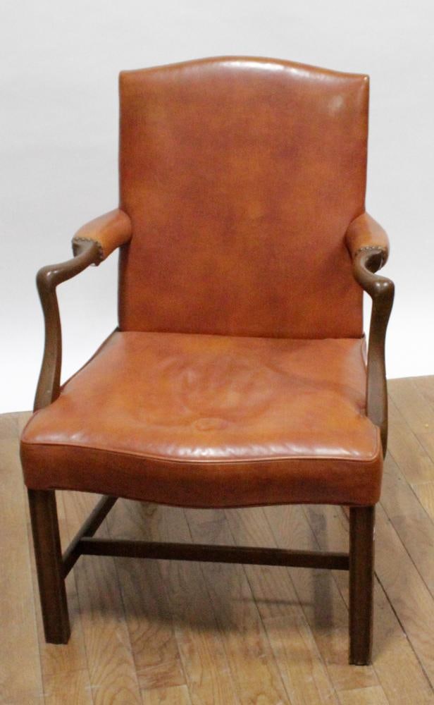 Vintage Kittinger Hepplewhite-Style Armchair: Vintage Kittinger Hepplewhite-style armchair, tangerine leather upholstery, approximately 37" H x 25" W x 26 1/2" D. Good condition. Provenance: Estate of Dalia Zikas, Melrose, Massachusetts.