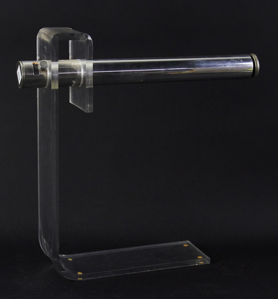Robert Sonneman Modern Chrome and Plexiglass Lamp: Robert Sonneman modern chrome and plexiglass tubular-design lamp, 18" H x 18" L x 4" D, together with a small chrome desk lamp on frosted glass base. Good condition. Provenance: Estate of Dalia Zikas,