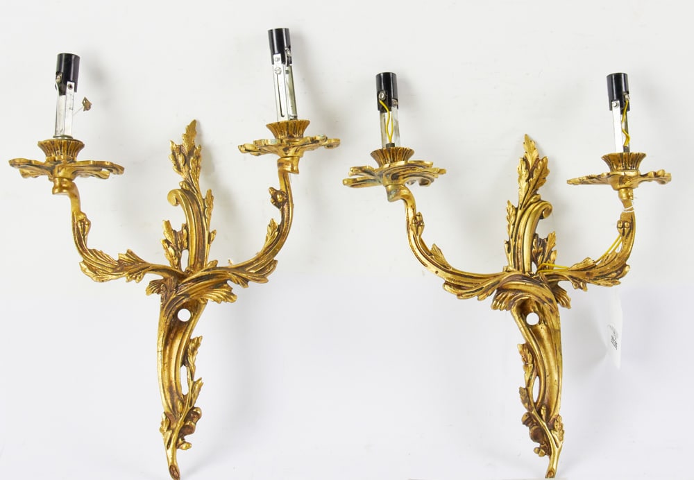 Pair of Vintage French-style Bronze Wall Sconces: Pair of vintage French-style bronze wall sconces, approximately 14" H. Good condition; need new candle covers and rewiring. Provenance: Estate of Dalia Zikas, Melrose, Massachusetts.