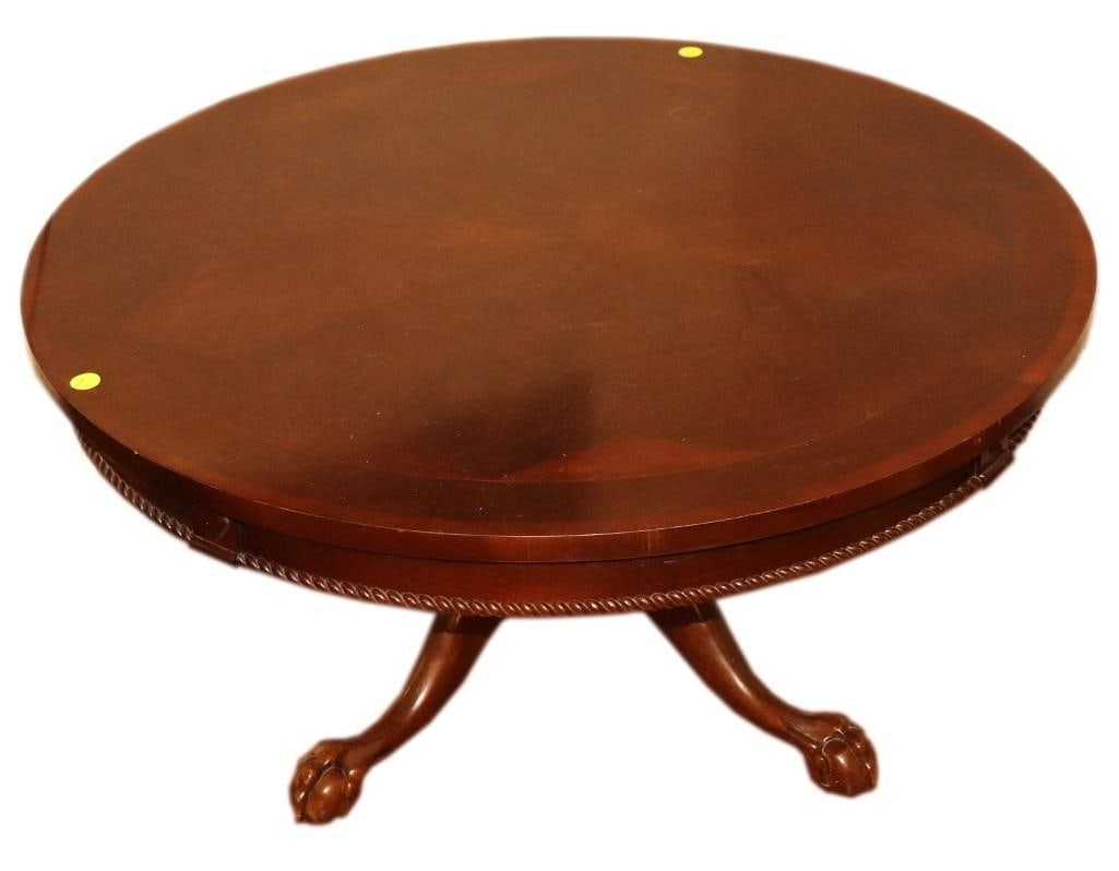 Chippendale Style Mahogany Round Cocktail Table: Chippendale-style mahogany round cocktail table.