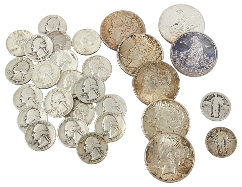 American Silver Coins, Dollars, Quarters: American silver coins, to include: (5) silver dollars, (2) 1889, (2) 1923, and (1) 1924; (2) 1985 Engelhard "The American Prospector", .999 fine; (22) quarters, 1964 and earlier. Approximately 10.7 tr
