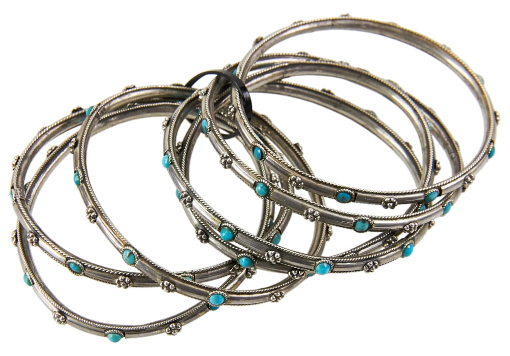 Sterling Turquoise Bangle Bracelets: Sterling turquoise bangle bracelets, (7) bands. Approximately 2.46 troy oz TW. Provenance: Palm Beach, Florida estate. PLEASE NOTE: payment for silver, gold, jewelry, and coins must be made via wire