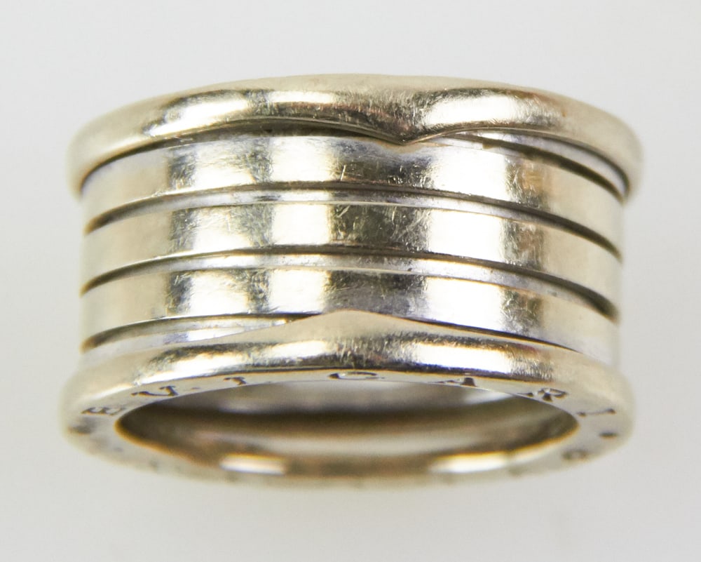 Bulgari 18k White and Gold 5-Ring Style Ring: Bulgari 18k white and yellow gold ring, 5-ring style. Ring size 9. Approximately 13.16 grams TW. Provenance: Palm Beach, Florida estate. PLEASE NOTE: payment for silver, gold, jewelry, and coins must