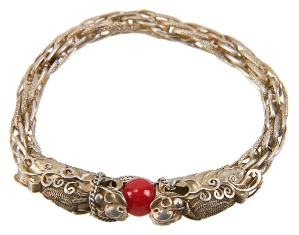 Chinese Silver Dragon Bracelet: Chinese silver dragon bracelet, 2 1/2". Approximately 0.9 troy oz TW. Provenance: Palm Beach, Florida estate. PLEASE NOTE: payment for silver, gold, jewelry, and coins must be made via wire transfer,