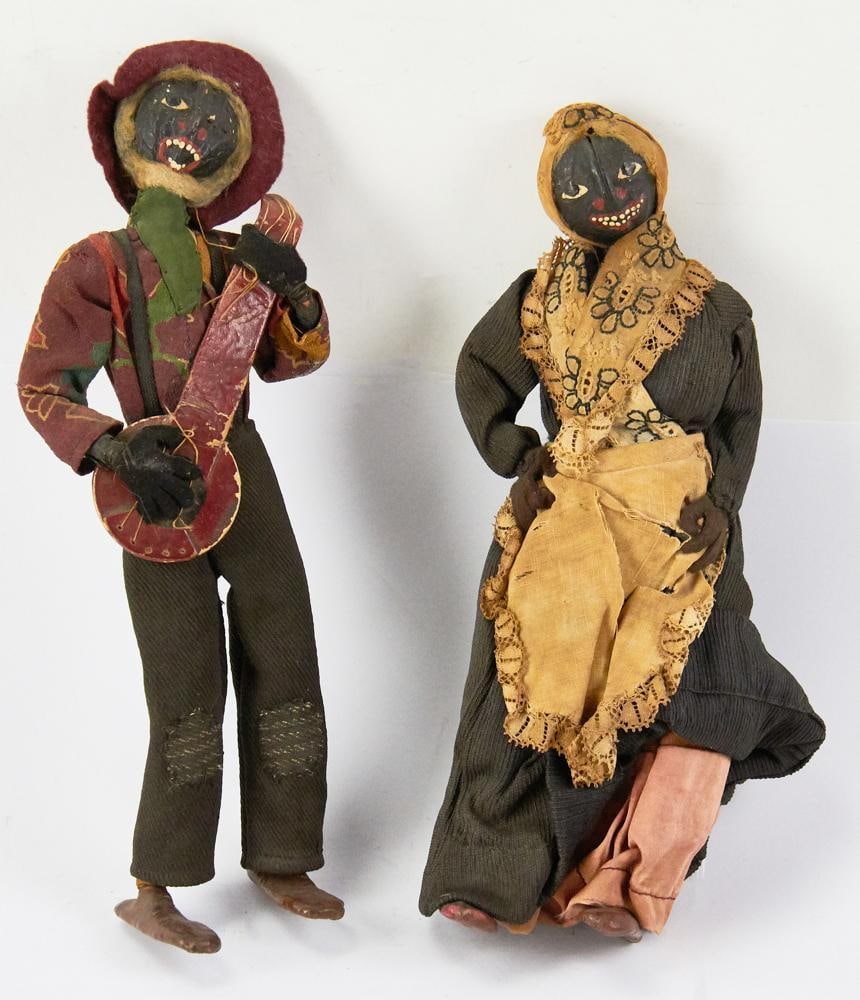Pair of Late 18thC Black Americana Walnut Head Dolls: Pair of late 18th century Black Americana walnut head dolls, man playing banjo, and maid. Provenance: Orange, Massachusetts collection.
