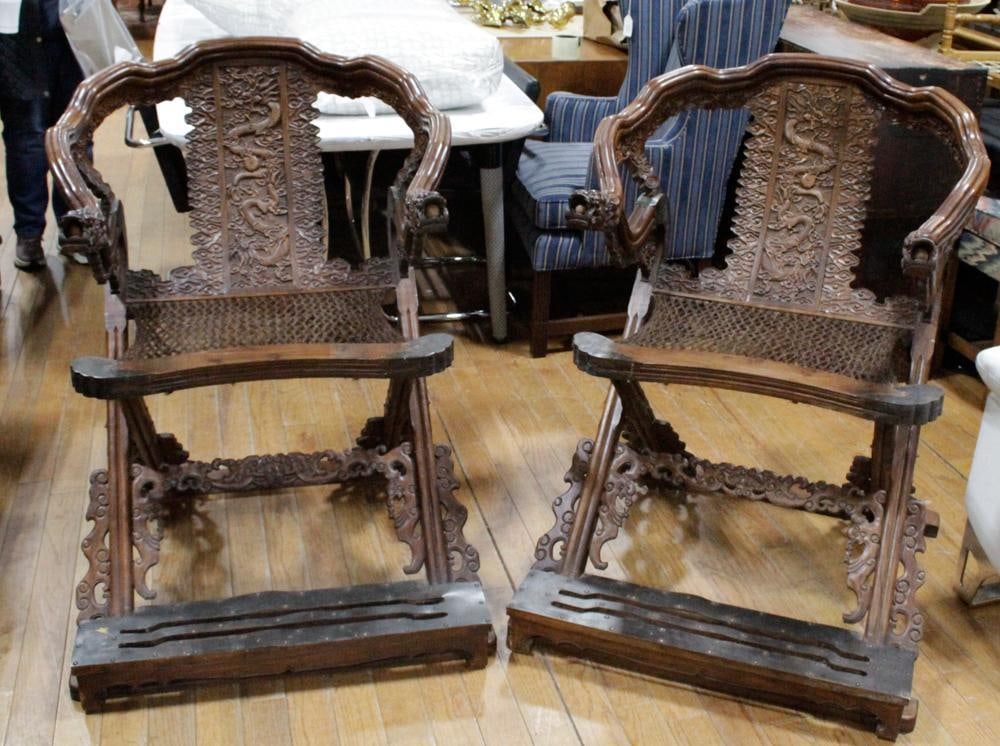 Pair of Antique Chinese Rosewood Folding Chairs: Pair of antique Chinese rosewood folding chairs, 42" H x 31" W x 31" D. Provenance: West Roxbury, Massachusetts collection. PLEASE NOTE: On KaminskiLIVE, lots valued at over $3,000 are