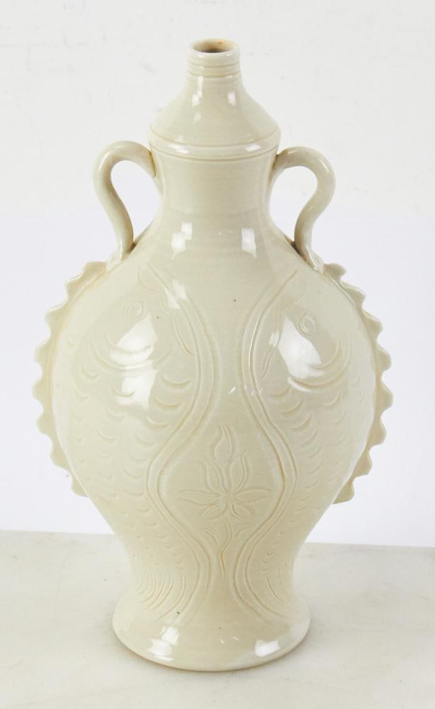 Chinese Ding Kiln Flower and Fish Carved Bottle: Chinese Ding kiln flower and fish carved bottle, 11" x 6". Provenance: Wells, Maine collection.