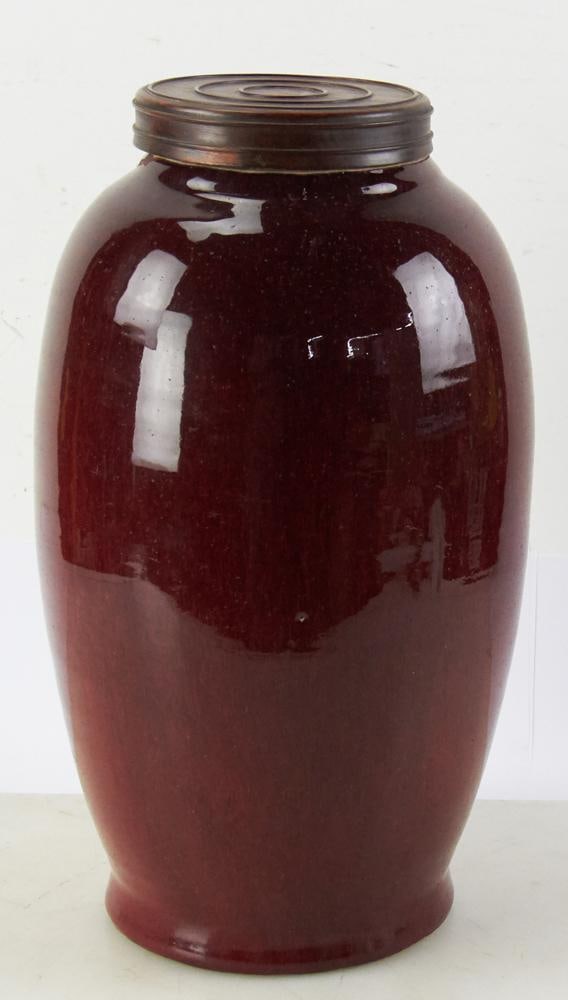 18th/19thC Chinese Ox-Blood Large Vase with Wood Cover: 18th/19th century Chinese ox-blood large vase with wood cover, 17" H x 9". Chip on base. Provenance: Hollywood, Florida collection.