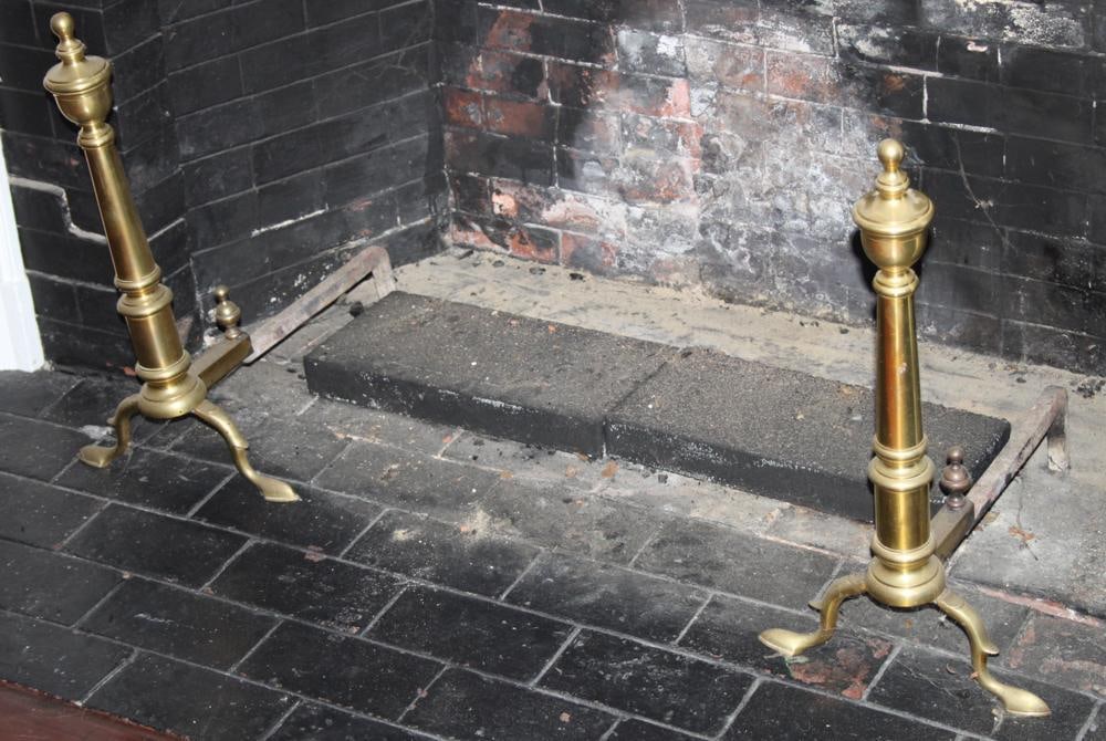 Pair of English Brass Andirons: Pair of English brass andirons, 23" H x 18" L. Provenance: Beverly Farms, Massachusetts collection.