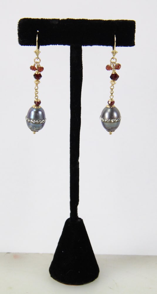 Pair of 14k Gold and Garnet Earrings: Pair of 14k gold and garnet earrings. Provenance: Swampscott, Massachusetts collection. PLEASE NOTE: payment for silver, gold, jewelry, and coins must be made via wire transfer, cash, or certified ban