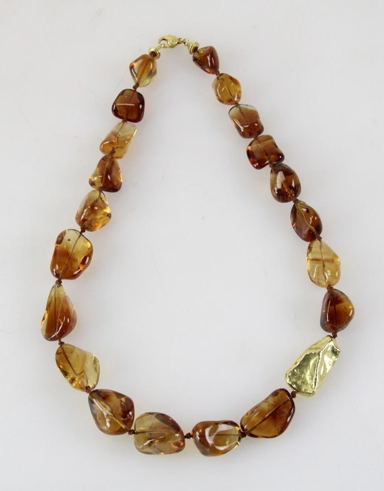 18k Gold and Golden Topaz Necklace: 18k gold and golden topaz necklace, signed Bust, 20" L. Provenance: Swampscott, Massachusetts collection. PLEASE NOTE: payment for silver, gold, jewelry, and coins must be made via wire transfer, cash