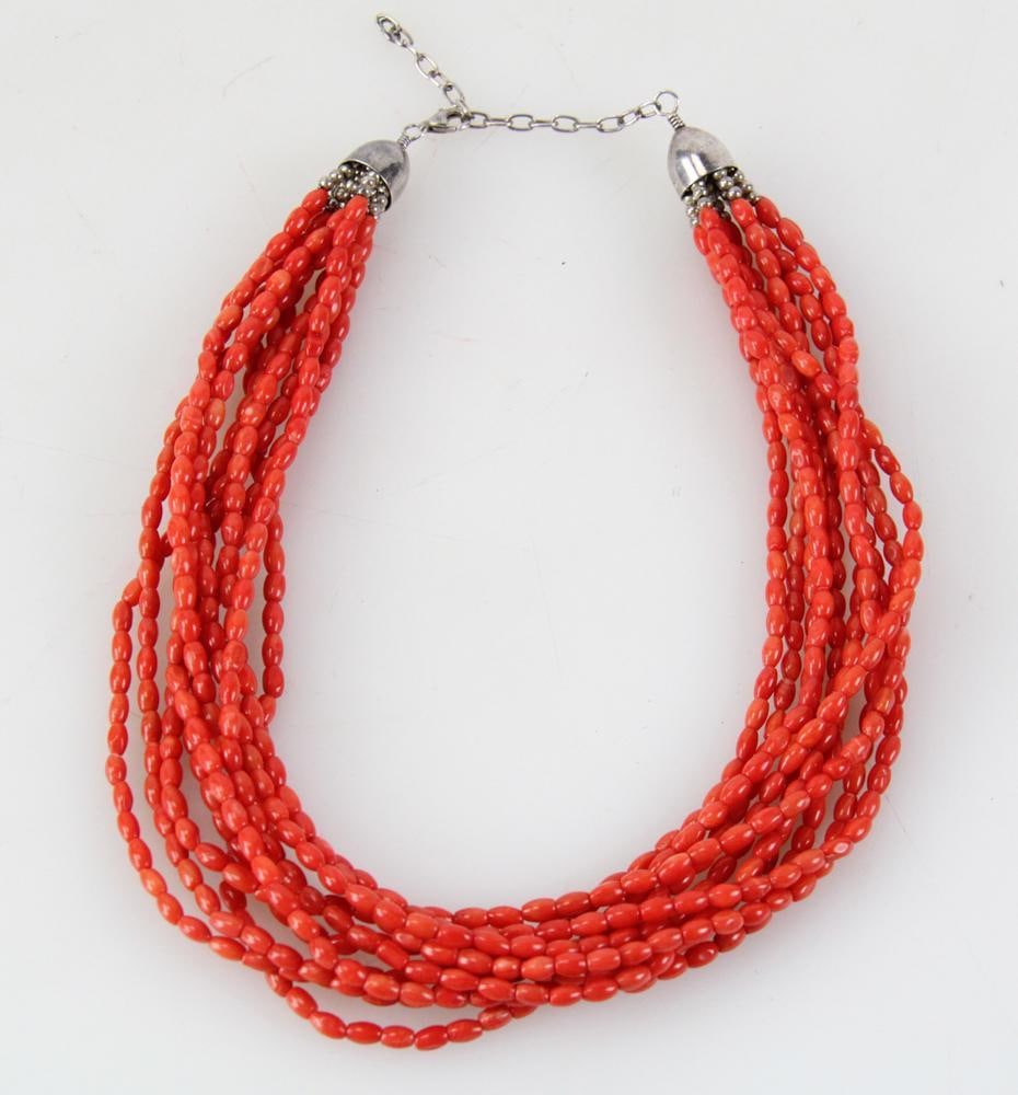 Coral and Sterling 10-Strand Necklace: Coral and sterling necklace having (10) strands, 16" L. Provenance: Swampscott, Massachusetts collection. PLEASE NOTE: payment for silver, gold, jewelry, and coins must be made via wire transfer, cash