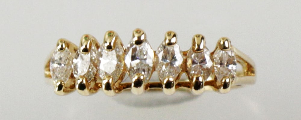 14k Yellow Gold and Marquise Diamond Ring: 14k yellow gold and marquise diamond ring, approximately 0.50 ctw, ring size 4 1/2. Approximately 2 grams TW. Provenance: Gloucester, Massachusetts collection. PLEASE NOTE: payment for silver, gold, j