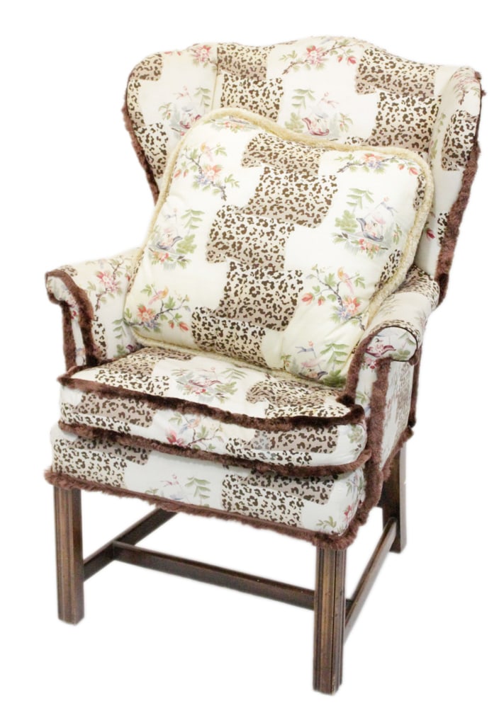 Chintz Upholstered Wing Chair with Pillow: Chintz upholstered wing chair with pillow. Provenance: Palm Beach, Florida estate.