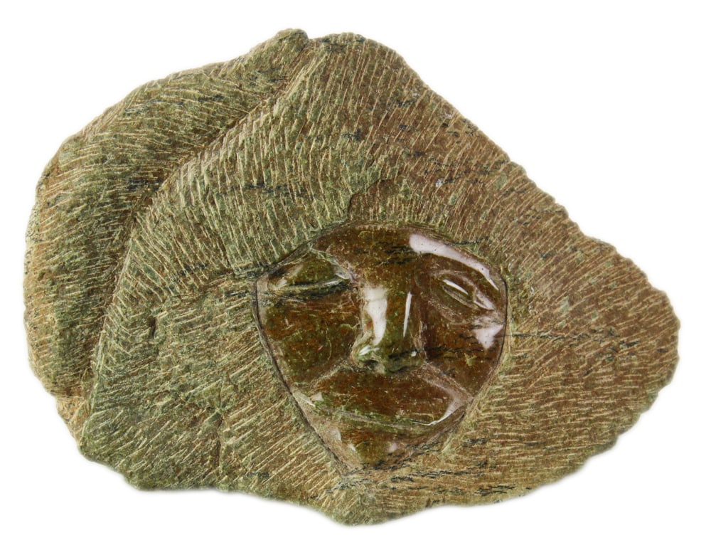 Inuit Carving of Hooded Man: Inuit carving of hooded man, 10" x 13". Provenance: Estate of Dalia Zikas of Melrose, Massachusetts.