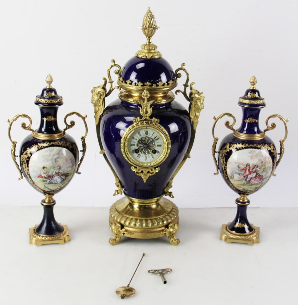 19thC French Cobalt Porcelain Vase Urn Clock: 19th century French large cobalt porcelain vase urn clock, brass ornamentation, 23" H. Small crack. Provenance: From the 50-year personal collection of Mr. John Hvozda of Hermitage, Pennsylvania.