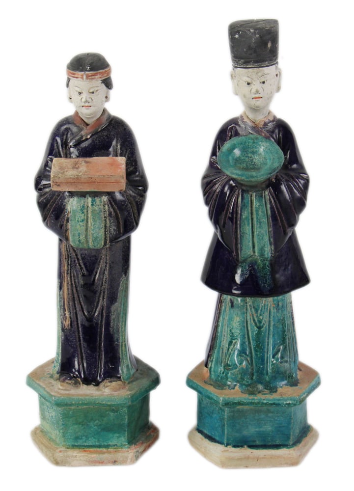 Pair of Chinese Ming Dynasty Sancai Glazed Pottery Figures: Pair of Chinese Ming Dynasty sancai glazed pottery standing figures of attendants or offerants, 17", 18" x 5 1/2". Provenance: Private collector from Rotterdam / Weston, Massachusetts.