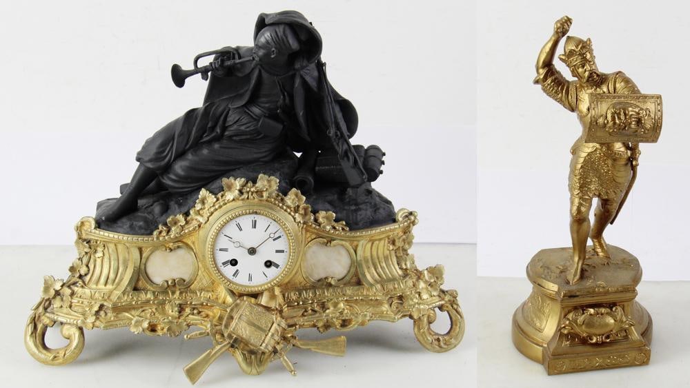 C1860 Large French Napoleon III Figural Mantel Clock: Circa 1860 large French Napoleon III figural mantel clock, "Zouave" reclining soldier on top (black), gold ornate front with inset white onyx ovals, 15" H x 19" W. Provenance: From the 50-year persona