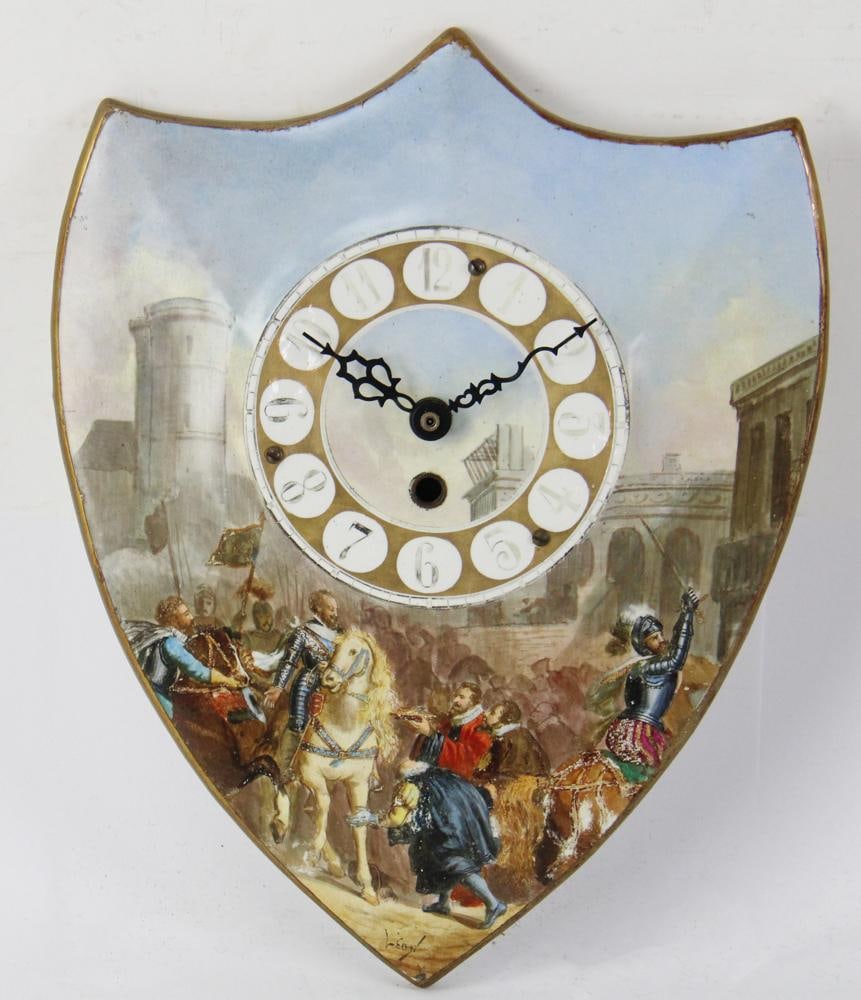 19thC French Porcelain Wall Clock with Medieval Knight: 19th century French porcelain shield-shaped wall clock with pastel hand-painted medieval knight scene, with quart movement added, 12" H x 9" W. Provenance: From the 50-year personal collection of Mr.