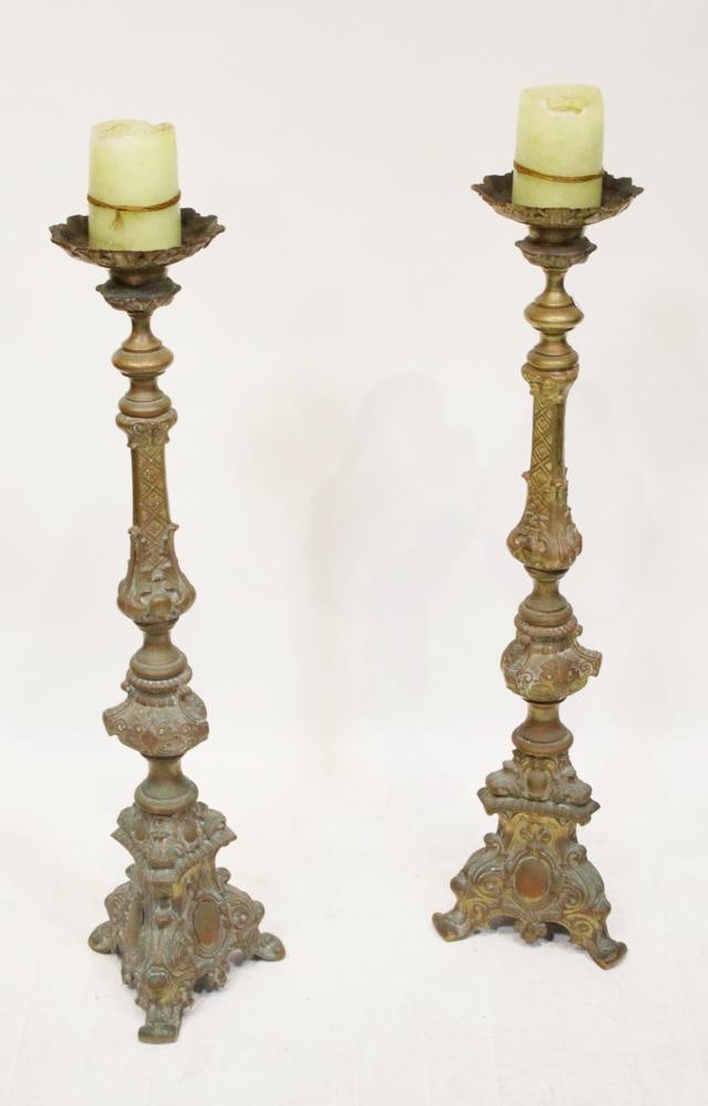 Pair of Antique Italian Baroque Brass Torchieres: Pair of antique Italian Baroque brass torchieres, 39" H x 10" x 10". Provenance: Palm Beach, Florida estate.