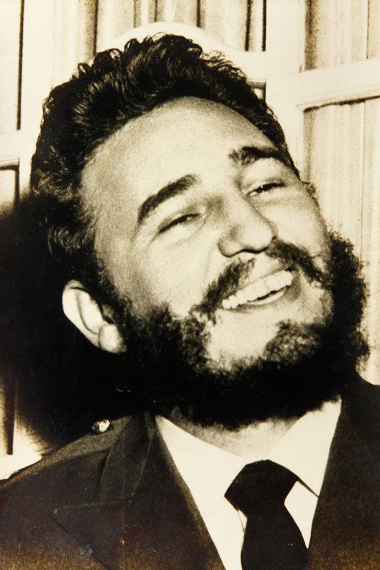 Photograph of Castro: Photograph of Fidel Castro in a suit and tie, stamped verso "St. Maranjo", 10"h x 8"w. Originally owned by Argentina Estevez.