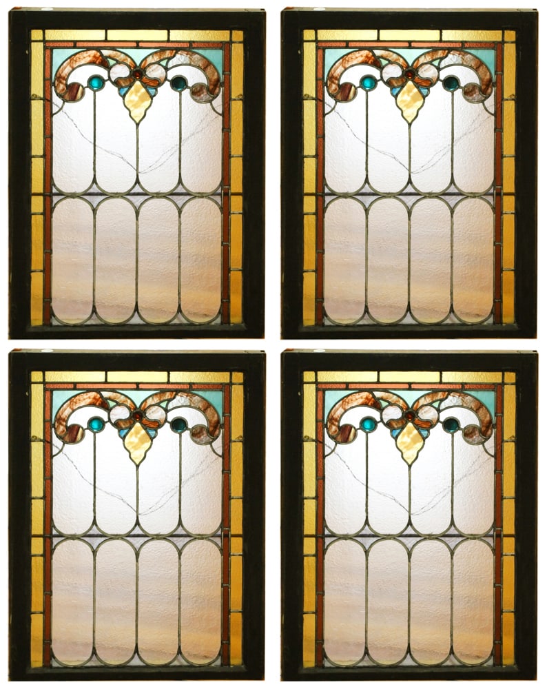 Stained Glass Panels in Frame: Stained glass panels in varnished frame, wall hung, (4) total. Provenance: The Second Congregational Church of Beverly, Massachusetts. PLEASE NOTE: Item to be picked up on location at the Second Congr