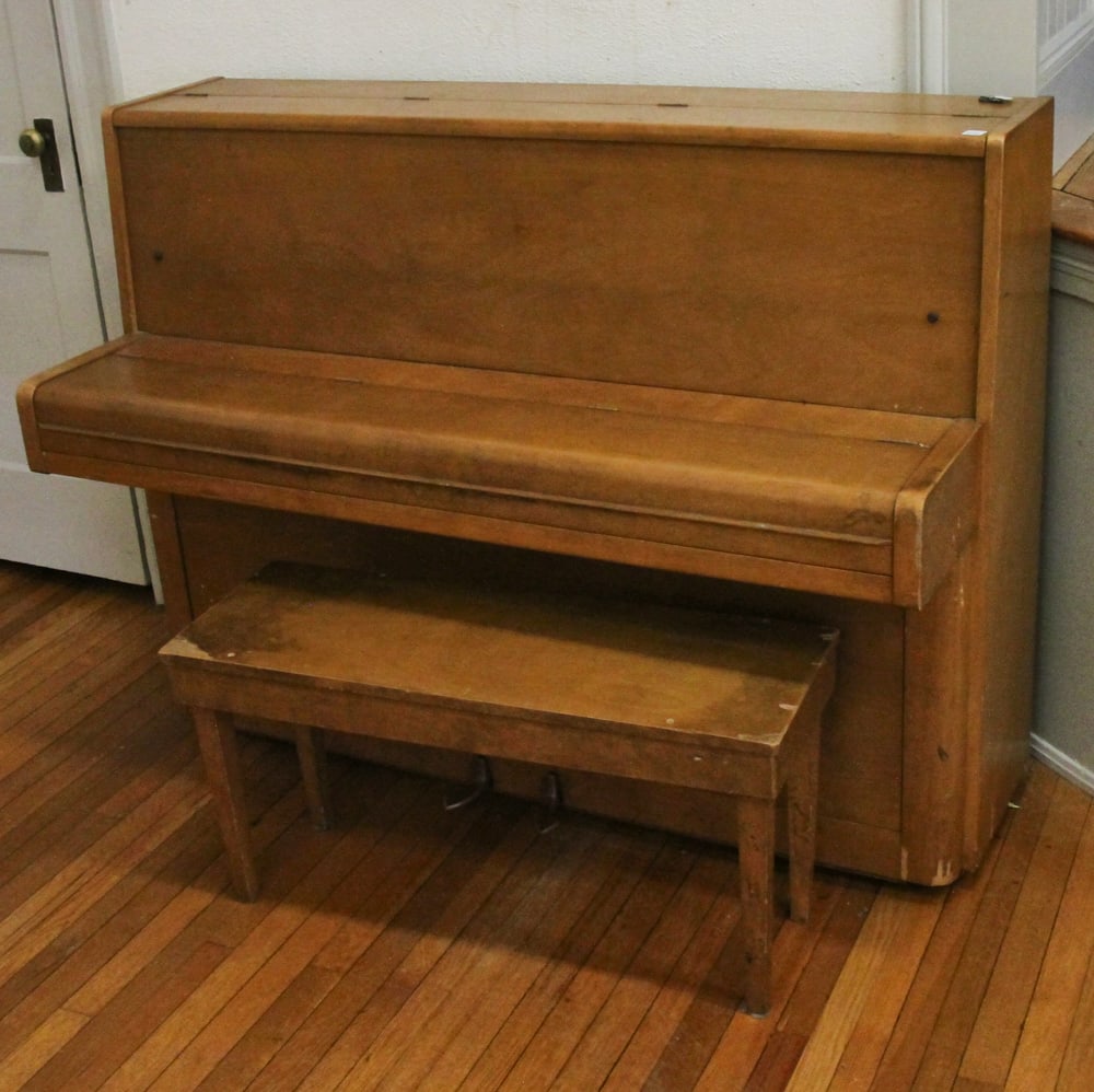 Yamaha Vertical Piano: Yamaha stained and varnished vertical piano, 44" x 59" x 25". Provenance: The Second Congregational Church of Beverly, Massachusetts. PLEASE NOTE: Item to be picked up on location at the Second