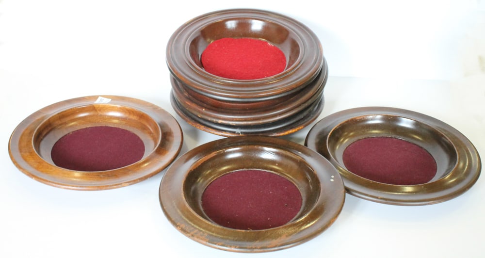 Lindenwood Collection Plates: Group of (9) lindenwood collection plates with padded centers, 12" diameter. Provenance: The Second Congregational Church of Beverly, Massachusetts. PLEASE NOTE: Item to be picked up on location at