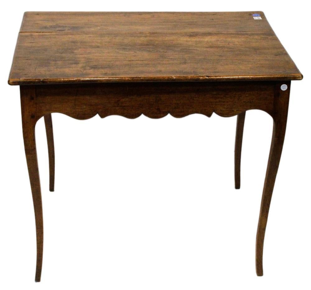 18th/19thC French Provincial Table: Late 18th/early 19th century French Provincial table, 22" H x 32" W x 25" D. Provenance: Nantucket Collection. PLEASE NOTE: This lot is not from the Second Congregational Church of Beverly.