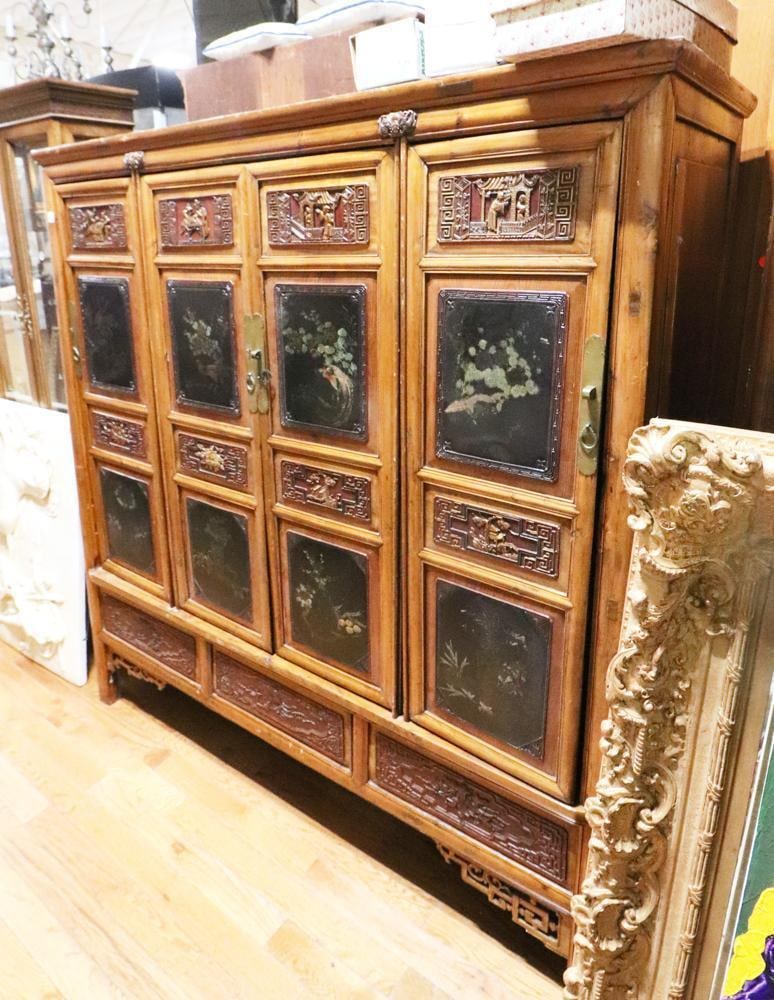 19thC Chinese Carved Cabinet: 19th century Chinese carved cabinet, 69" H x 64" W x 26" D. Provenance: Palm Beach, Florida estate. PLEASE NOTE: This lot is not from the Second Congregational Church of Beverly.