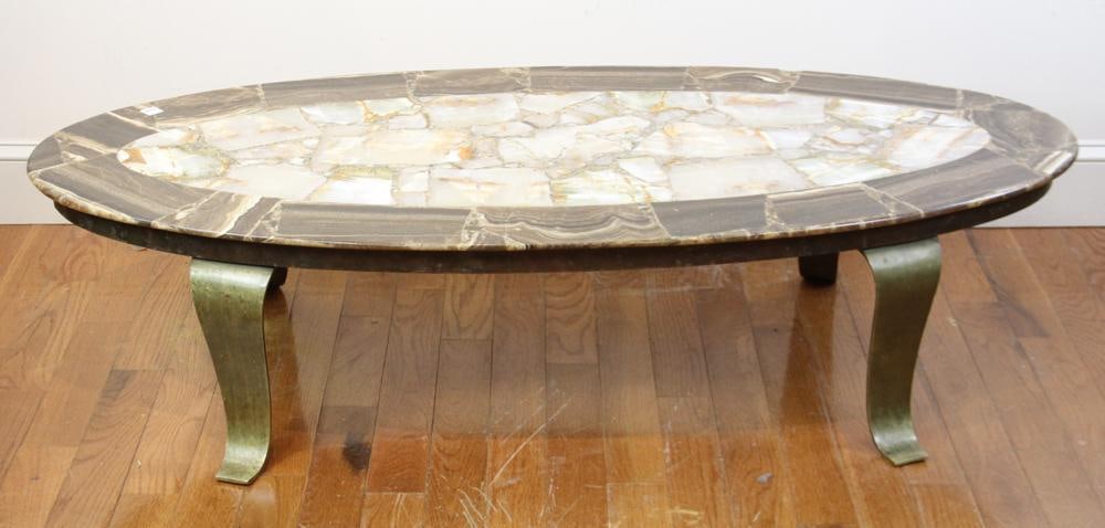 Mid-century Stone-top Table on Brass Legs: Mid-century stone-top table on brass legs, 14" H x 63" W x 26" D.PLEASE NOTE: This lot is not from the Second Congregational Church of Beverly.