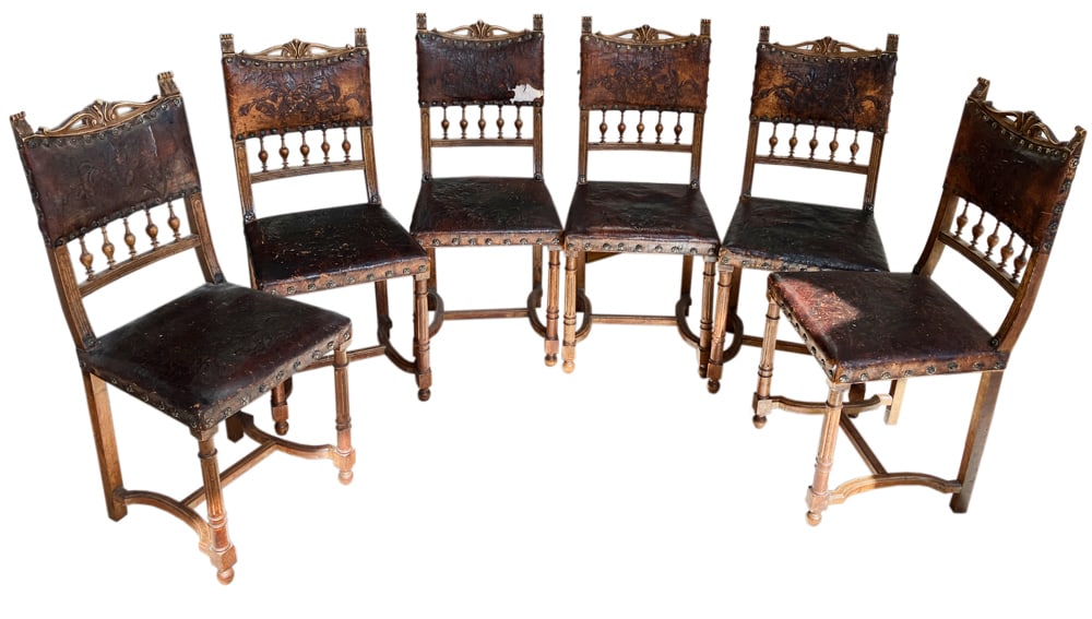 Set of 19thC French Henry II Style Side Chairs: Set of six (6) 19th century French Henry II style side chairs, embossed cherry blossom design leather seats and backs, floral brass tacks, 38" H x 17" W x approximately 18" D. Leather shows age wear,