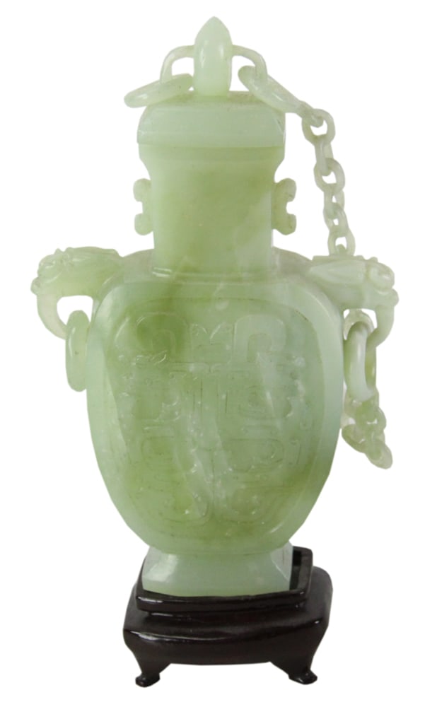 Chinese Pale Green Jade Lidded Vase: Chinese pale green jade lidded vase, 8" x 5", with stand. Provenance: Estate of Thomas Nicholson of Palm Beach, Florida and Stratham, New Hampshire.