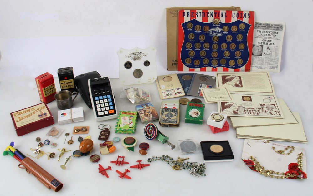 Vintage Cards, Pins, Tin Banks, Sparkler Spinner, etc.: Assorted 1950s-1970s unique items, old playing cards, college pins, plastic planes, tin banks, sparkler spinner toy, 1940 President brass medals, proof coins, etc. Provenance: Beverly, Massachusetts