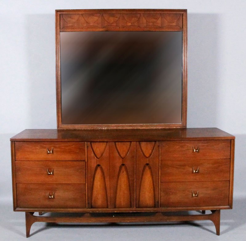 Broyhill Premier Dresser and Mirror: Broyhill Premier "Brasilla" Line dresser and mirror, lower unit with six drawers, cabinet with three pull out drawers, fabric label inside drawer, dresser 30 3/4" x 66" x 19", mirror 40 1/4" x 44".