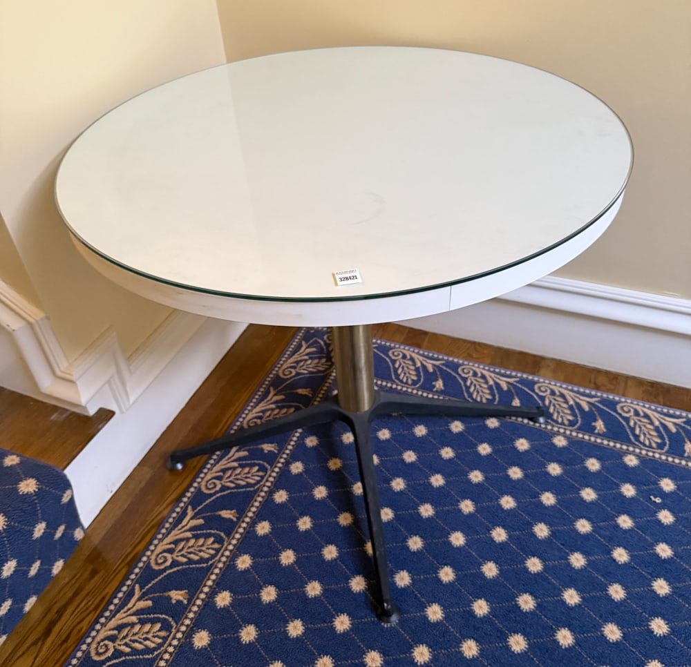 White Formica Occasional Table: White Formica occasional table, 27" H x 32" diameter. PLEASE NOTE: Item to be picked up at 129 Commonwealth Ave, Boston. Deadline for pick-up is May 15th. Please call our front desk at 978-927-2223