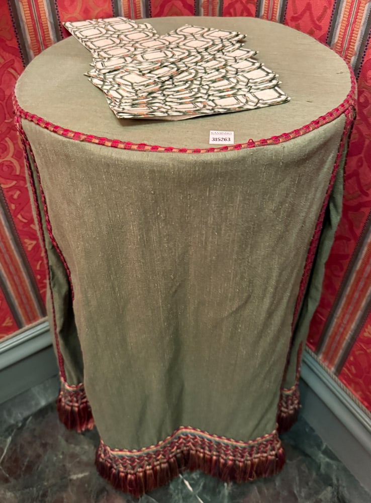 Circular Table with Green Skirt: Circular table with green skirt, 36" H x 17 1/2" diameter. PLEASE NOTE: Item to be picked up at 129 Commonwealth Ave, Boston. Deadline for pick-up is May 15th. Please call our front desk at 978-927-22