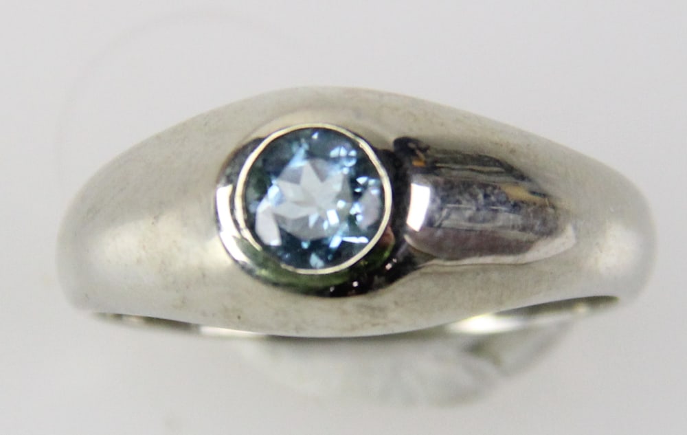 18k White Gold Aquamarine Ring: 18k white gold and aquamarine ring, size 8 1/2. Approximately 8.91 grams TW with stone. Provenance: Miami Beach, Florida collection. PLEASE NOTE: payment for silver, gold, jewelry, and coins must be