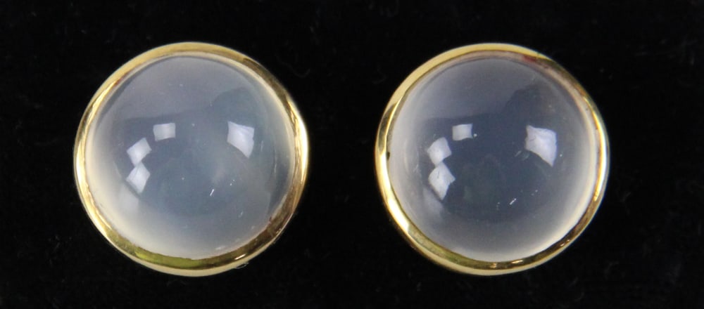 14k Gold Round Moonstone Stud Earrings: 14k gold and round moonstone stud earrings. Provenance: Miami Beach, Florida collection. PLEASE NOTE: payment for silver, gold, jewelry, and coins must be made via wire transfer, cash, or certified ba