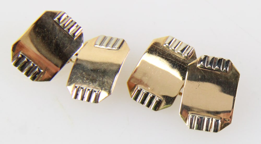 10k Yellow and White Gold Trim Oblong Cufflinks: 10k yellow and white gold trim oblong cufflinks. Approximately 5.20 grams TW. Provenance: Miami Beach, Florida collection. PLEASE NOTE: payment for silver, gold, jewelry, and coins must be made via wi