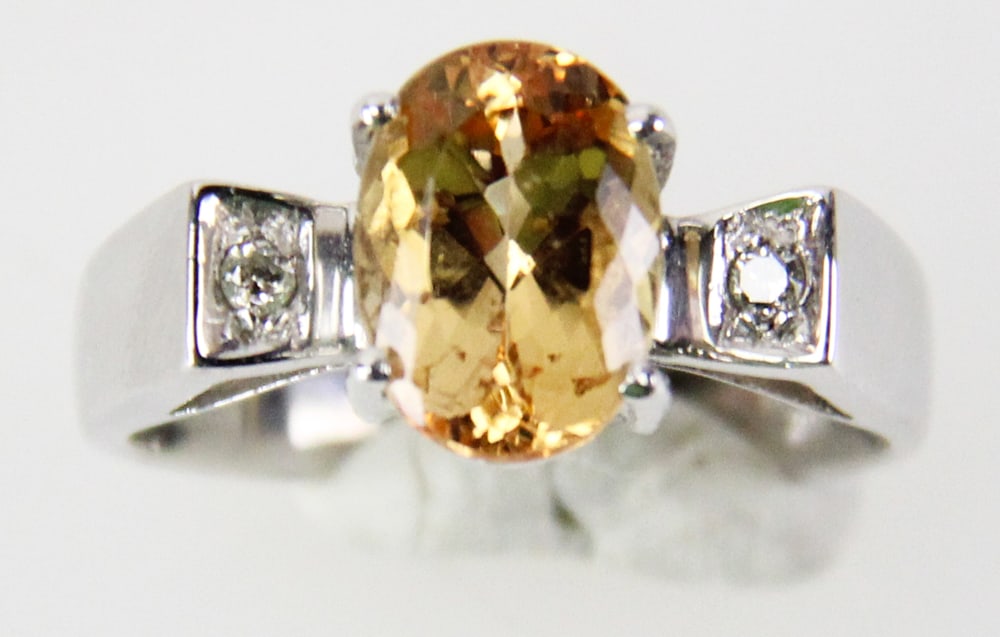 14k Gold Oval Topaz Ring: 14k gold ring with 2.5 ct oval topaz, size 6. Approximately 3.45 grams TW. Provenance: Miami Beach, Florida collection. PLEASE NOTE: payment for silver, gold, jewelry, and coins must be made via wire