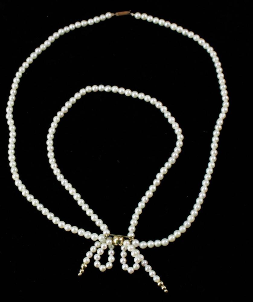 Pearl and Gold Lariat Necklace: Pearl and gold lariat necklace, 26" L. Provenance: Boston, Massachusetts estate collection. PLEASE NOTE: payment for silver, gold, jewelry, and coins must be made via wire transfer, cash, or