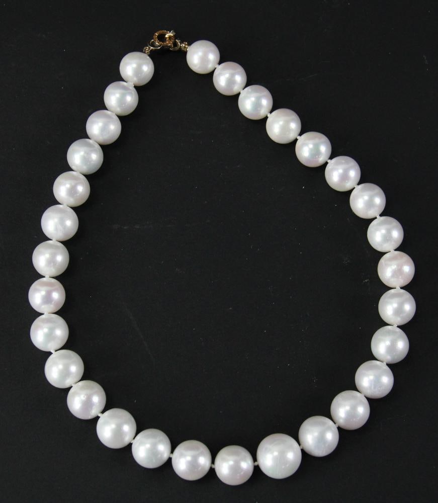South Sea Pearl Necklace with 18k and Diamond Clasp: South Sea pearl necklace with 18k gold and diamond clasp, pearls 13-13.5mm, 16 1/2" L. Provenance: Honolulu, Hawaii collection. PLEASE NOTE: payment for silver, gold, jewelry, and coins must be made v