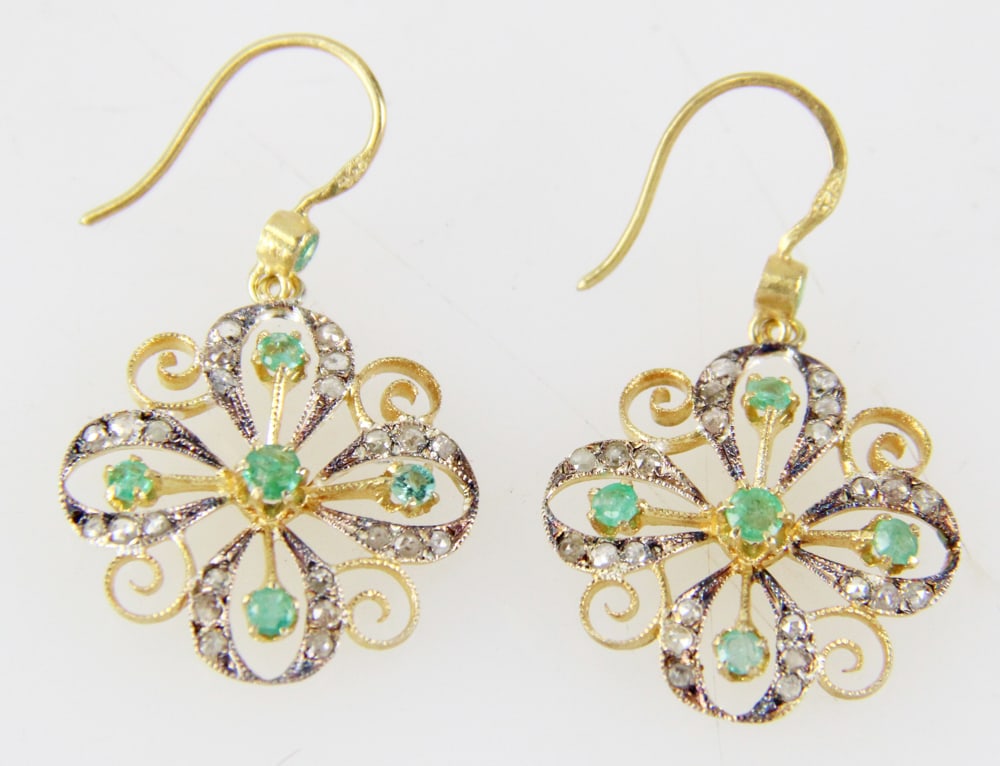 Pair of Sterling Earrings with Diamonds and Emeralds: Pair of sterling earrings, (48) rose cut diamonds, approximately 0.40 ctw, (10) emeralds, approximately 0.50 ctw, 7/8" diameter. Approximately 3.1 grams TW. Provenance: Bangkok, Thailand collection. P