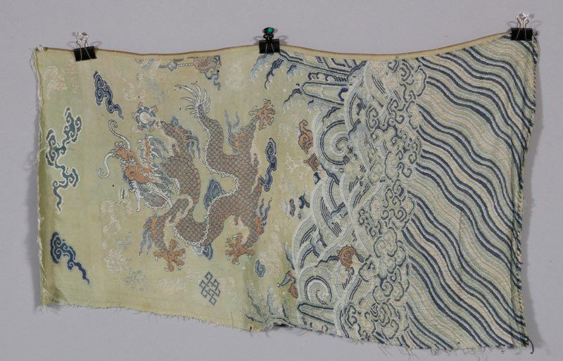 Chinese Dragon Robe Panel: Dragon robe panel, China, early Qianlong Period (1711-1799), from an imperial dragon robe made for the Qianlong Emperor, bright yellow in color with one five-clawed dragon chasing a flying pearl.