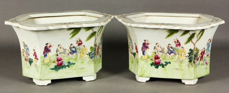 Chinese 19th C. Famille rose Flower Pots: Pair of famille rose flower pots, China, 19th century, each having lobed edges, with a motif of boys and scholars enjoying various activities, 8 3/5" x 14 1/2" x 9 1/2".
