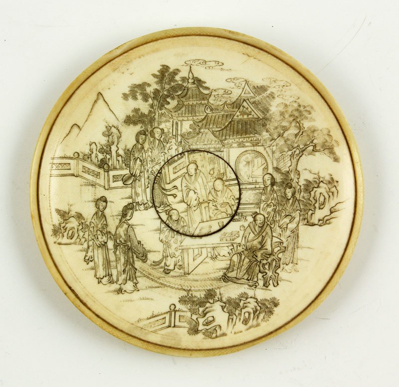 Chinese 18th/19th C. Carved Ivory Tray: Finely carved ivory flat saucer/tray, China, 18th/19th century, with eight Buddhist elements motif, 4 1/8" dia.